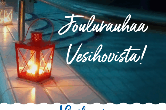 Joulurauhaa Vesihovista, punainen kynttilälyhty loistaa pimeässä altaan reunalla. Rauhallinen tunnelma kuvassa.